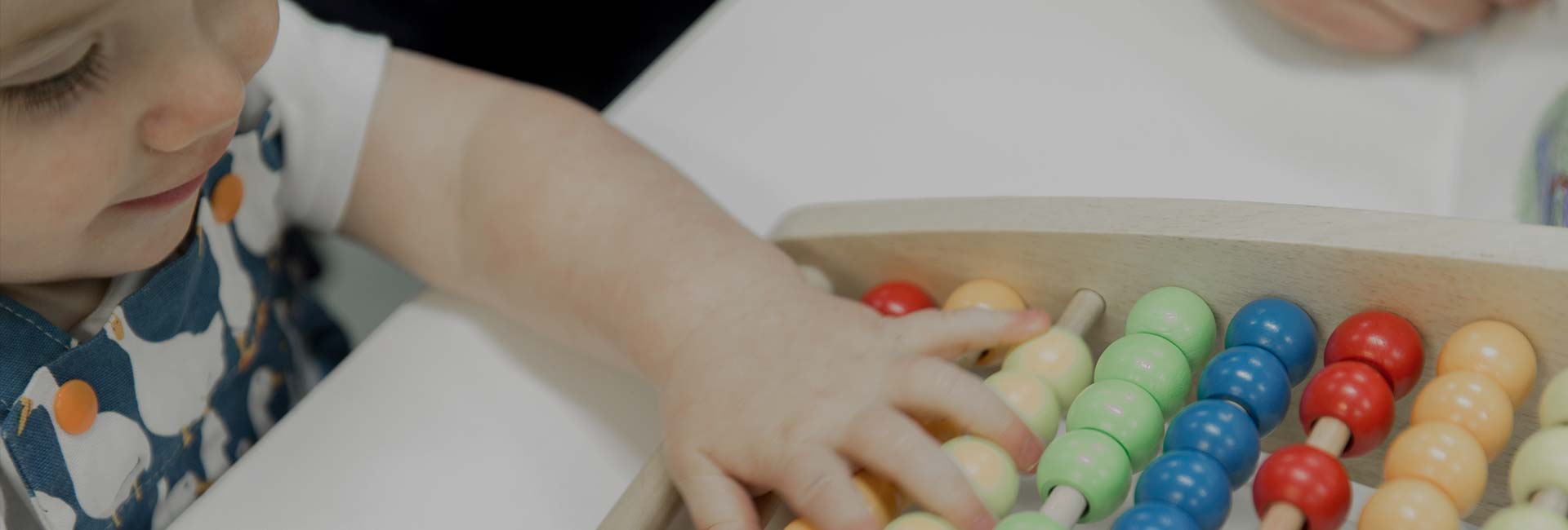 Child Playing With Toys