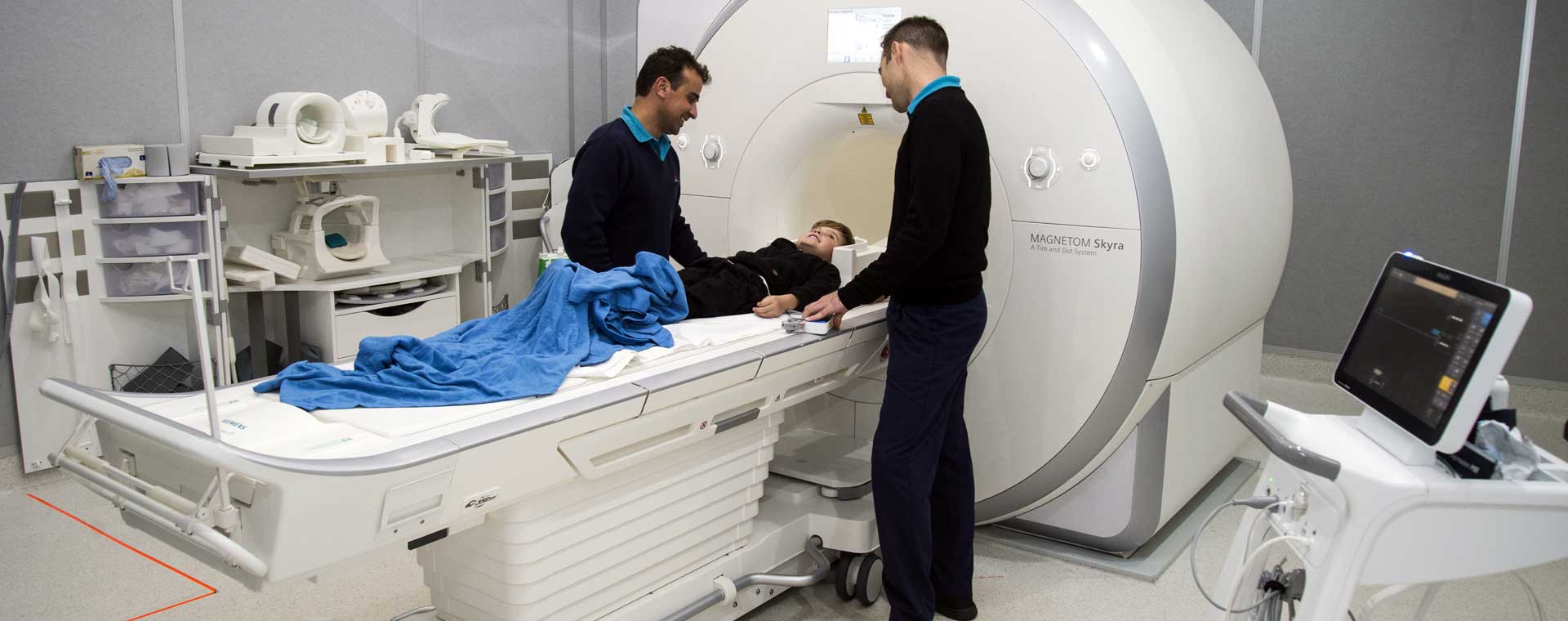 Medical Imaging Staff With Patient